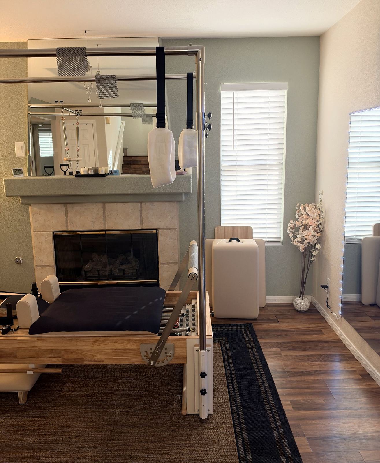 Eve's studio, with a Reformer and tower by the window